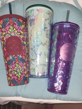 Three Starbucks Cups